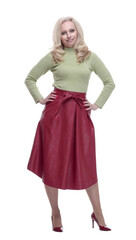 Fototapeta premium attractive young woman in a red skirt. isolated on a white