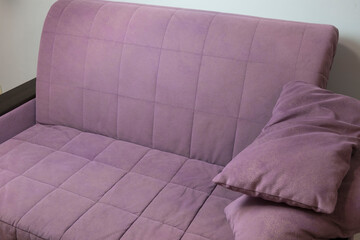 suede, new, beautiful purple sofa with two pillows