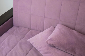 suede, new, beautiful purple sofa with two pillows