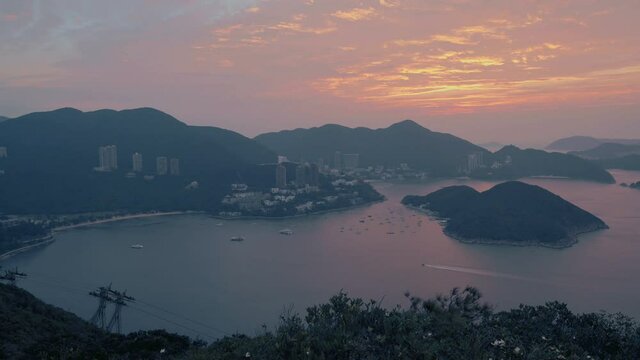 Overlooking view of Middle islands, buildings in seaside at Deep Water Bay, Hong Kong seen form brick hill (nam long shan)