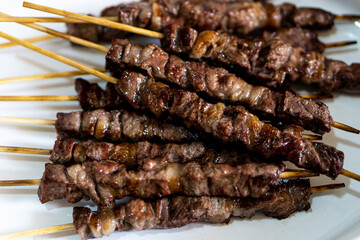 Delicious meat skewers prepared for grilling