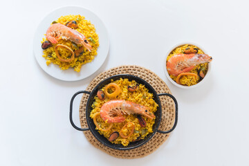 Paella typical spanish food in granite background