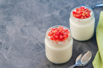 Pomegranate with natural yogurt