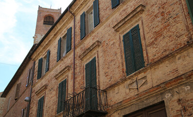 Fototapeta na wymiar Facade of ancient building in the town of Citta della Pieve in Umbria, Italy
