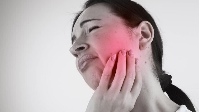 Woman suffering from toothache
