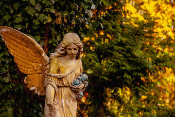 Sad guardian angel. Fragment of an antique statue. Free copy space for design or text.