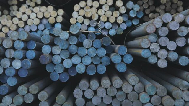 Warehouse of metal billets at the factory, round metal blank, metal blank.