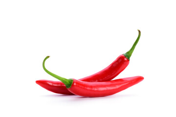 Red fresh chilies are spicy, placed on a white background.