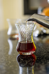 Making Turkish tea called Chai at home.