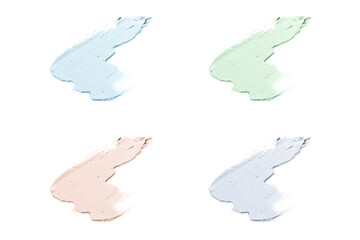 Smears of cosmetic clay isolated on a white background.