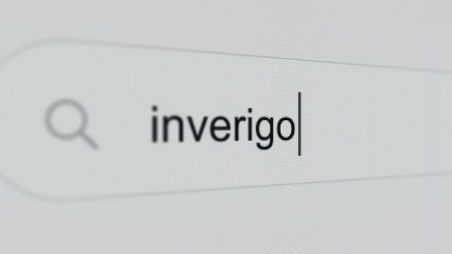 Inverigo - Internet browser search bar typing text name of Brianza village with camera movement.