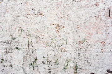 Texture of a concrete wall with cracks and scratches which can be used as a background