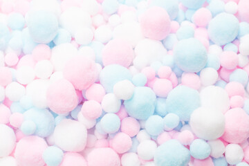 White, pink and blue soft pompons.