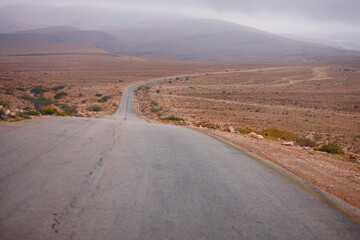 straight empty road to Mukalla City, Yemen