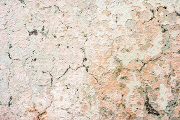 Texture of a concrete wall with cracks and scratches which can be used as a background