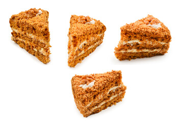 Peace of honey cake isolated on white background.