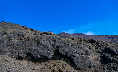 Fototapeta na wymiar Landscape with lava rocks on mount Etna, Sicily, Italy 