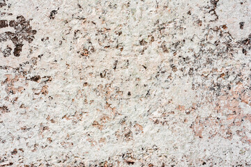 Texture of a concrete wall with cracks and scratches which can be used as a background
