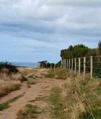 Fototapeta premium campagne et arc-en-ciel