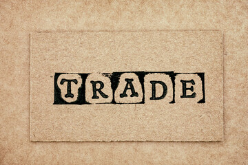 Cardboard with word Trade