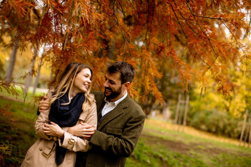 Young couple in the autumn park