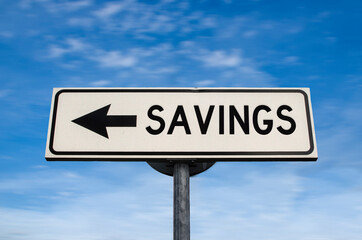 Savings road sign, arrow on blue sky background. One way blank road sign with copy space. Arrow on a pole pointing in one direction.