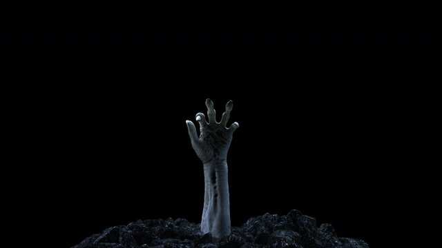 Zombie hand crawling out of the ground with alpha channel