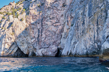 Rocky coast and grottos of the cape Aya. Balaclava environs, Sevastopol, Crimean peninsula, Russia.