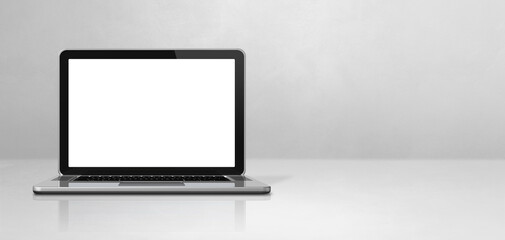 Laptop computer on white concrete office scene background banner