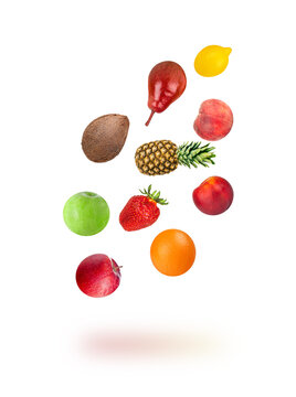 fruits fly and fall isolated on white. Set of orange, apple, lemon fruits flying from top to bottom