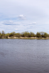 River and clouds floating in the calm sky