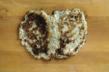 Pancakes with vegetable filling grilled on the barbecue during outdoor recreation