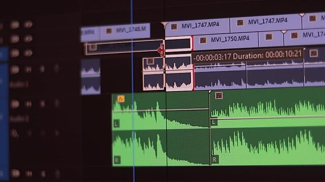 Movie editor adds footages on timeline doing video editing of project in computer program extreme close view