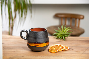 ceramic coffee cup on wooden table