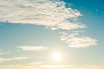 Dawn blue sky with white clouds, blue sky background with clouds, azure sky with clouds