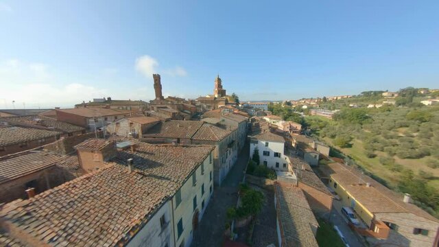 Flyover Old City And Landscape Of Comune Sinalunga Tuscany Italy - aerial shot