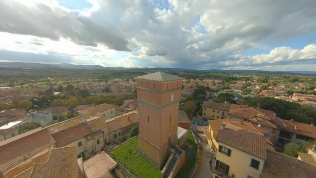 Flock Of Birds Flying Over Comune Village Of Bettole In Sinalunga, Tuscany, Italy. - FPV, aerial