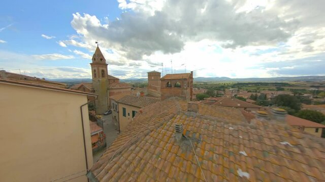 View Of Bell Tower Of Church Of San Cristoforo In Bettolle, Sinalunga - low aerial drone