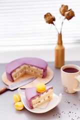 mousse cake of currant and biscuit with macaroon and coffee