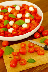 tomato salad with mozzarella balls and basil