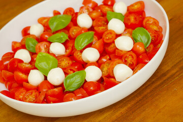 tomato salad with mozzarella balls and basil
