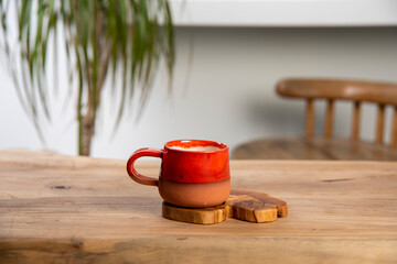 ceramic Turkish coffee cup on the wooden table