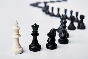 The chess king leader, the concept for a comparison of a great leader will always have followers. ideas white background