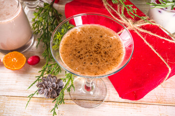Set of different Christmas and winter drinks. An assortment of Christmas cocktails, hot and cold beverages, in cozy wooden home background with Xmas decor
