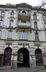 Facade of an old building with a balcony