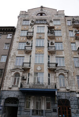 Fototapeta na wymiar Facade of an old building with a balcony