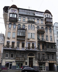 Facade of an old building with a balcony