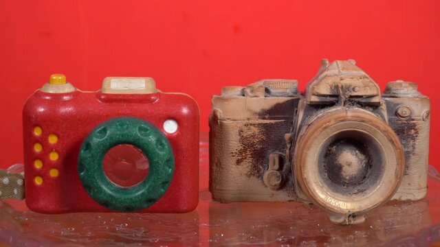 Old retro photo camera made with chocolate vintage objects sought after by collectors to furnish the home and remember the past years
