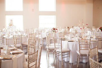 wedding reception with gold chiavari chairs