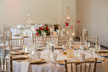 gold and red themed wedding reception tables